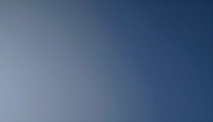 Fototapeta premium Gradient of blue sky, fading from light to dark.
