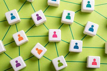 Connecting people network of figures on green grid