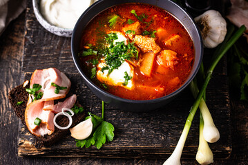 Traditional Ukrainian borsch with sour cream