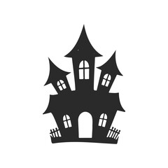 Spooky silhouette of a haunted house with steep roofs and arched windows