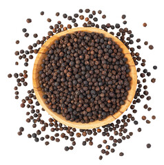 Black peppercorns piled in wooden bowl on transparent background