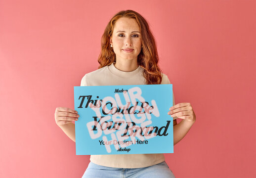 Mockup of Woman Displaying A3 Poster