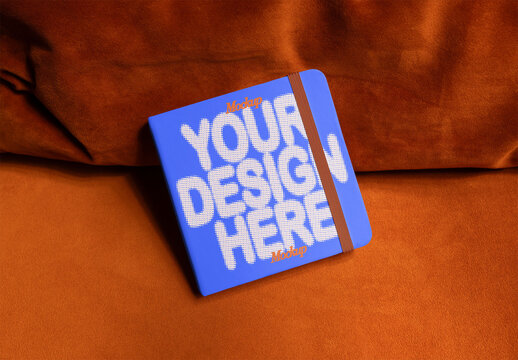 Mockup of Square Notebook With Elastic Band