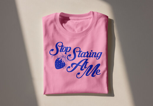 Mockup of folded T-Shirt on Neutral Surface