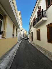 Fototapeta premium The old narrow streets of the Plaka district located at the foot of the Acropolis in Athens