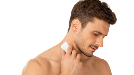 Naklejka premium Man applying skincare product on neck, isolated on white background.