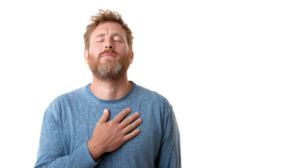 Man expressing gratitude with hand on heart, peaceful moment.