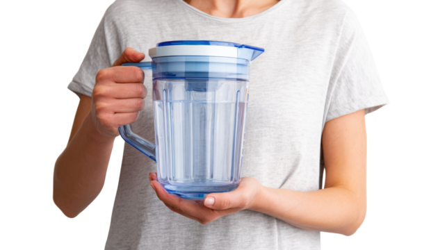 Person holding a water pitcher, focusing on hydration and healthy living. Ideal for wellness themed content.