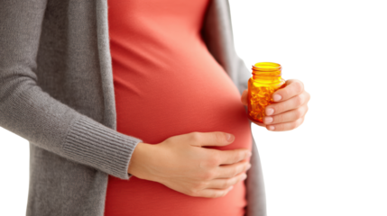 Pregnant woman holding medicine bottle with warm background, emphasizing health and wellness.
