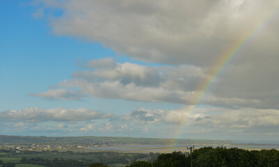 rainbow in the clouds,weather, landscape, sky, clouds, blue, rainbow, summer, sun, cloudscape, nature