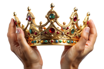 Hands holding a golden crown adorned with colorful jewels isolated on transparent background, symbolizing royalty, power, and luxury