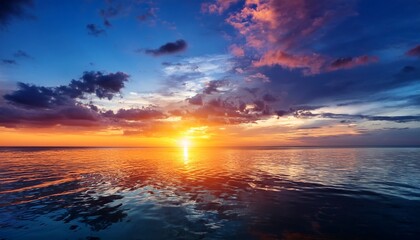 vibrant sunset over calm ocean waters with colorful sky reflections