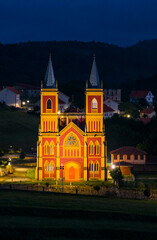 Fototapeta premium Aerial view from a drone of the neo-Gothic Church of San Pedro Ad Enlace in the town of Cóbreces, in the municipality of Alfoz de Loredo. Cóbreces, Cantabria, Spain, Europe