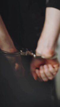 Criminal hands in handcuffs Jail Crime Arrest Incarceration Punishment Justice Prison Law Enforcement	