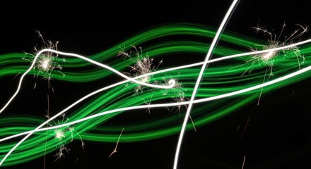 Abstract light trails, green and white, with sparks
