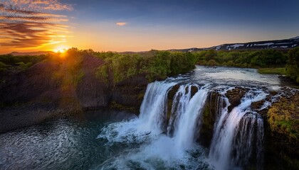 Fototapeta premium captivating sunset waterfall showcases charming beauty of nature encouraging reflection and appreciation for charming fleeting moments of twilight
