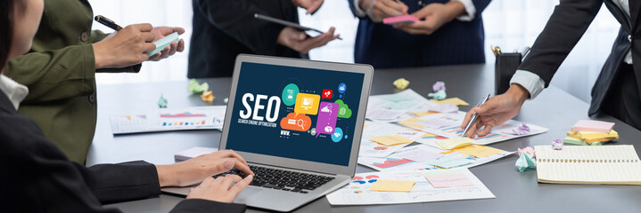 Analyst team use sticky note for creative and analytic brainstorm for business idea with BI data dashboard on laptop screen. Analysis financial data visualization tech for marketing strategy. Prodigy