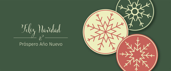 A set of three snowflakes on red, beige and green round background with the Spanish text "Feliz Navidad & Pr&oacute;spero Ano Nuevo" (Merry Christmas & Happy New Year). Web banner