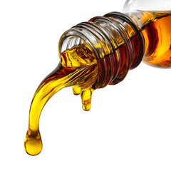 Oil pouring from a glass bottle onto a surface isolated on white background