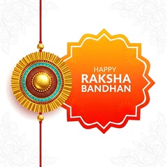 A rakhi design with a golden and blue circular ornament and happy raksha bandhan text on orange shape
