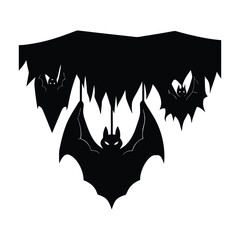 Three black silhouette bats hanging from a jagged dark shape