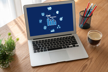 Fototapeta premium Cost reduction, cost saving concept shown on computer screen brisk, corporate business efficiently save cost and company resources by reduction of unnecessary expenses