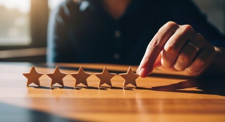 Hand placing a star on a rating scale