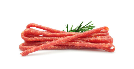 Dried cured sausages, thin salami sticks, cabanossi or kabanosy isolated on white background	