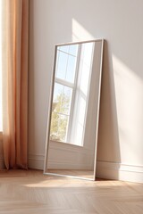 Tall mirror reflecting natural light in a bright, airy room with large windows