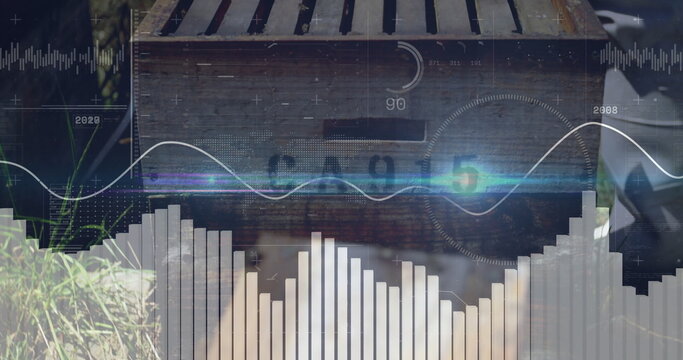 Displaying wooden slatted hive box showing analytics overlay on backyard grass, with sensor data