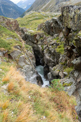 Mountain Stream Rushing Through a Rocky Gorge