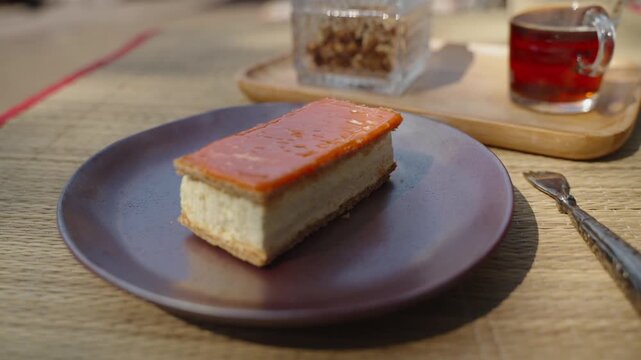 Orange Tompouce Cake, Dessert served with a Tea. Typical Dutch Pastry eaten especially for King's Day national Holiday