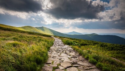 stone path leading through grassy terrain under a cloudy sky in the bieszczady mountains inviting outdoor exploration and adventure © Rowan
