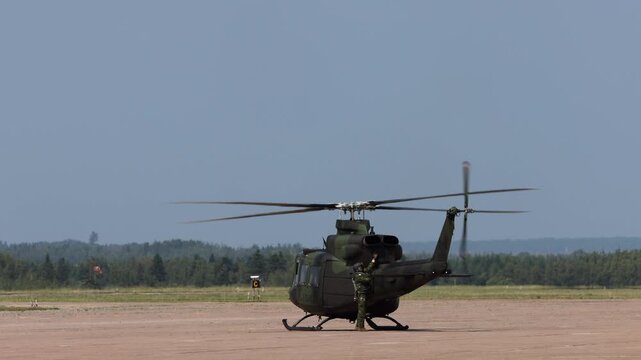 Summerside Prince Edward Island Canada - July 15th 2025 - Canadian Armed Forces CH-146 Griffon Helicopter checking engines before flight