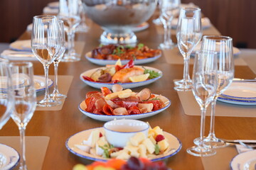 An Elegant Dining Table Setting adorned with Exquisite Gourmet Cuisine and Fine Delicacies