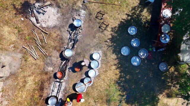 Aerial 4K footage of a traditional rain prayer and keşkek festival in Kurtlu Village, Boyabat, Sinop, Turkey. Local culture, people, and rural life captured from above during the vibrant ceremony