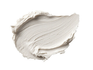 Creamy, light beige substance, smudged and swirled.  Soft, textured, and smooth application.  Isolated on black