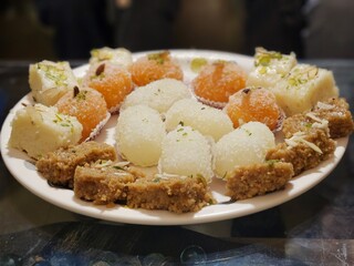 Variety of Indian Sweets kept on a plate