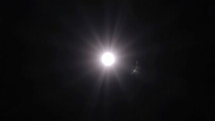 Blurred rainbow refraction overlay effect. Light lens prism effect on black background. Holographic reflection, crystal flare leak shadow overlay. Colorful rainbow disco ball light