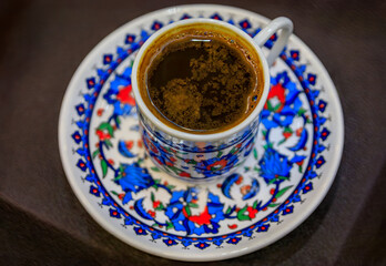 A cup of traditional Turkish coffee on a matching Iznik saucer, Istanbul, Turkey