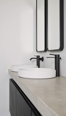 Modern minimalist bathroom sink showcases a sleek concrete countertop and sophisticated black fixtures