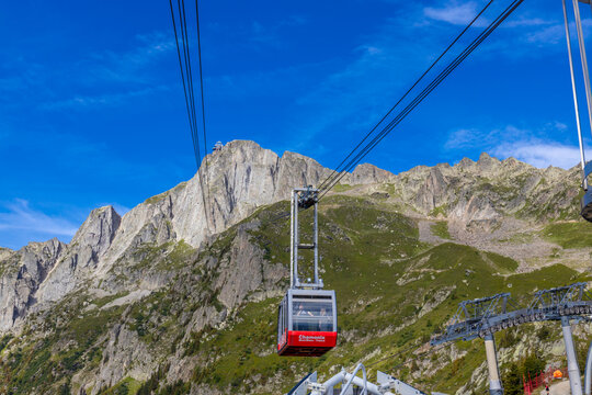 Chamonix, France - 07.07.2024: Cable car gondola in Chamonix Mont Blanc. Aiguille du Midi, Brevent and Valle Blanche Cable Car Telecabine Panoramic Mont-Blanc in French Alps mountain area