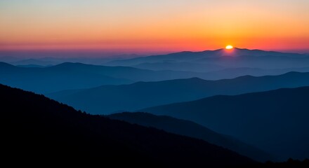 Obraz premium Majestic Mountain Ranges Bathed in the Golden Light of a Stunning Sunrise