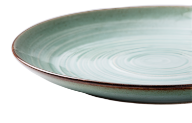 Close-up of a light teal ceramic plate with swirling design and a dark brown rim