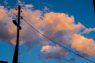 sunset clouds on sunny day with blue sky
