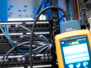 Professional network equipment with cables and testing device for telecommunications system maintenance and diagnostics