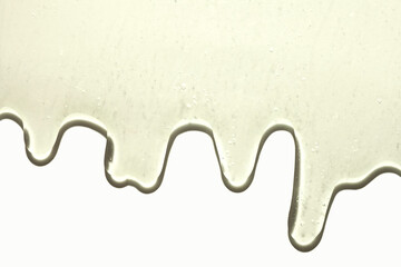 Cream gel orange yellow transparent cosmetic cleansing oil or serum ampoule sample texture with bubbles on white background