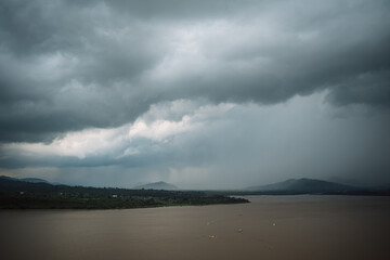 A cloudy day with a storm over a lake surrounded by hills in Mexico. Patzcuaro, Michoacan.