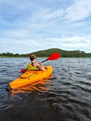 young woman kayaking