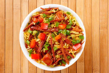 Arroz de Carreteiro, Carter's Rice, in a ceramic bowl, a typical dish of Southern Brazilian cuisine with rice and dried meat